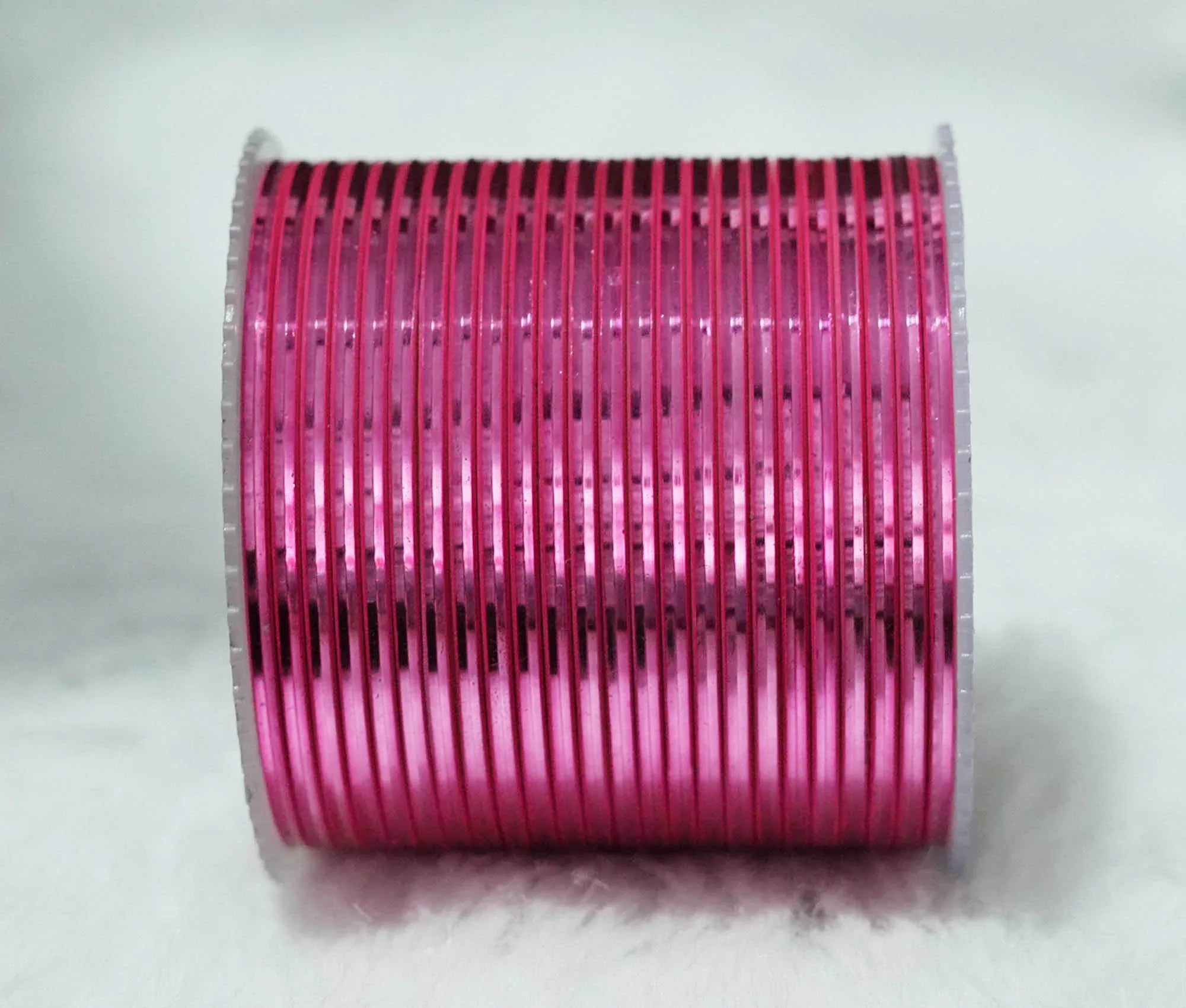 Gajari Color Glossy Metal Bangle for Women & Girls (Pack of 24) - The Golden Cascade